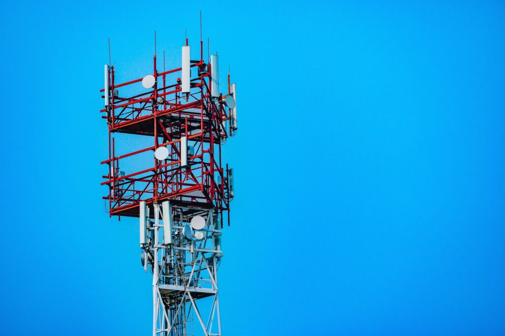 Aerial drone view of 5G telecommunication tower. GSM and radio telecommunication tower.